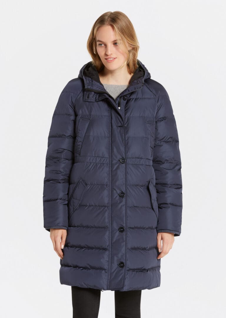 Woman modeling navy blue hooded winter coat