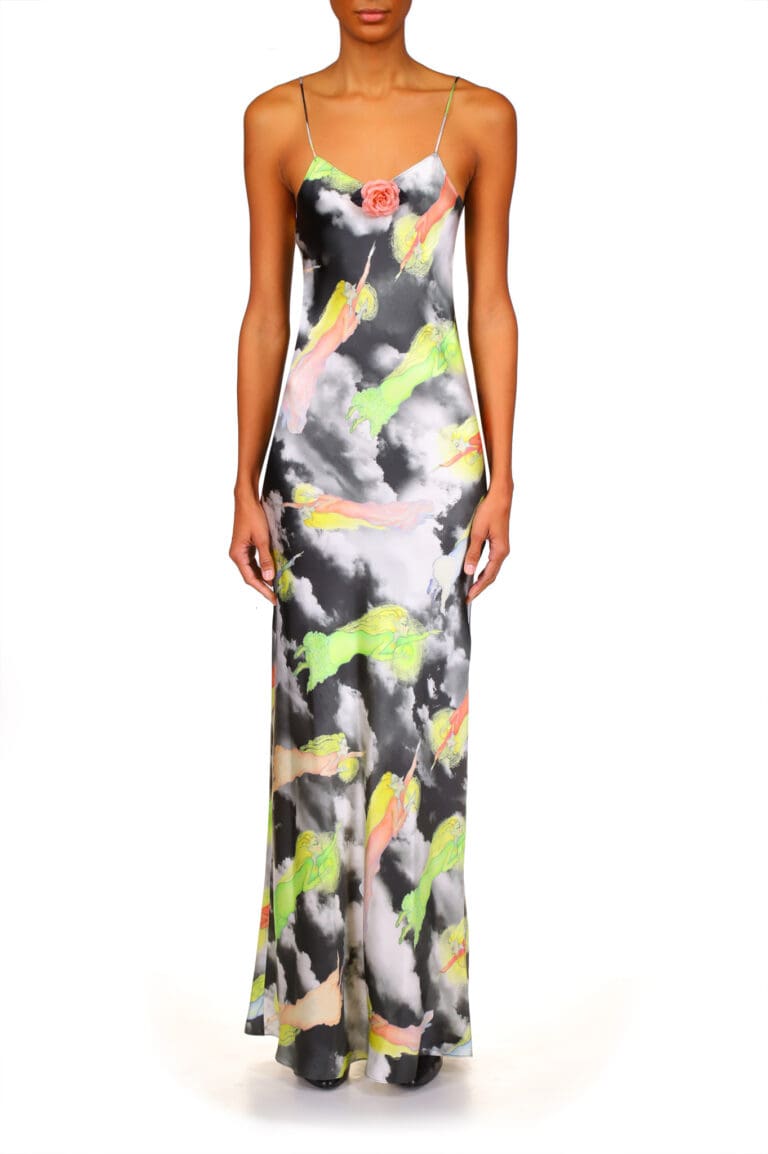 Woman modeling colorful patterned maxi dress