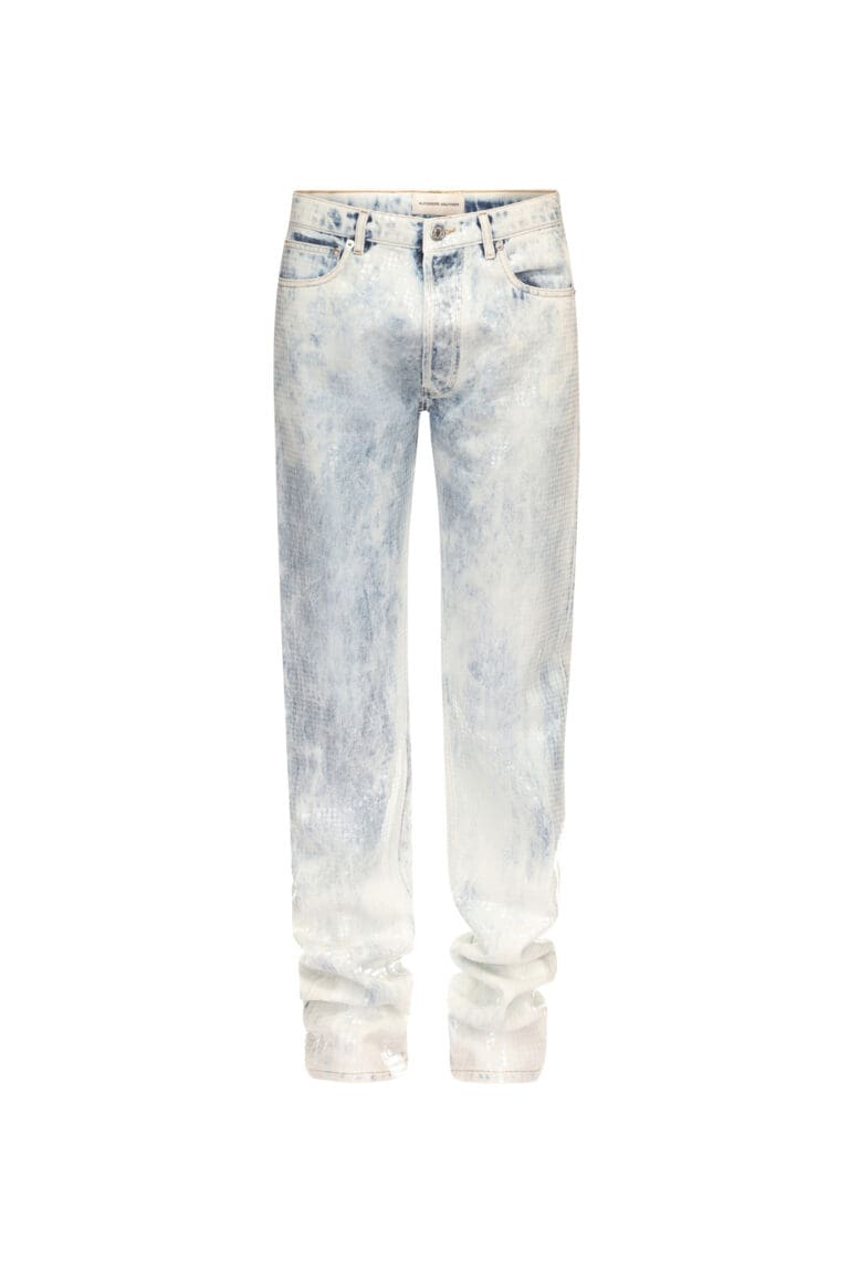 Light wash distressed denim jeans isolated on white